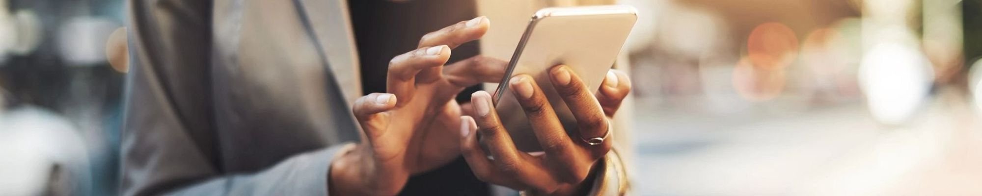 person using smartphone while out walking - Carpet Depot Inc in the North Hollywood, CA area